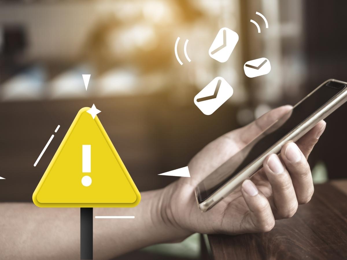 Sms telefono simbolo attenzione