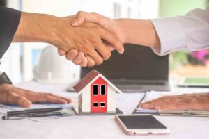 Stretta di mano e casa