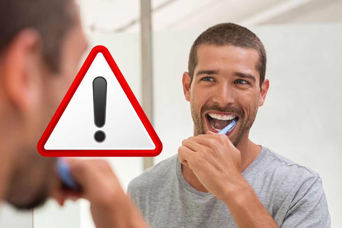 Uomo che si lava i denti simbolo pericolo