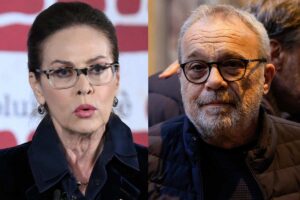 Elena Sofia Ricci e Claudio Amendola in primo piano con espressione seria