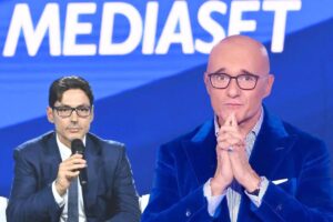 alfonso signorini e pier silvio berlusconi con scritta mediaset