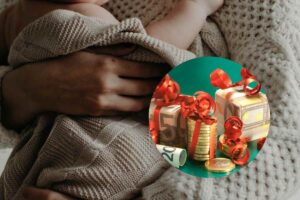 bambino in braccio e soldi